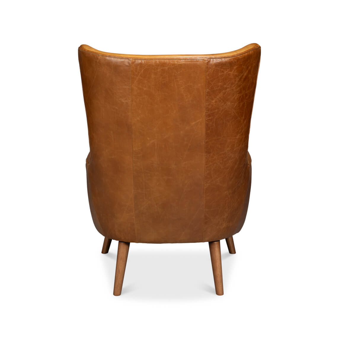 Back view of brown leather wingback chair, high back.