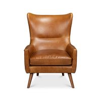 Brown leather wingback chair, front view, cushion detail.
