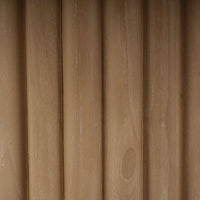 Detail of the ribbed column base texture.