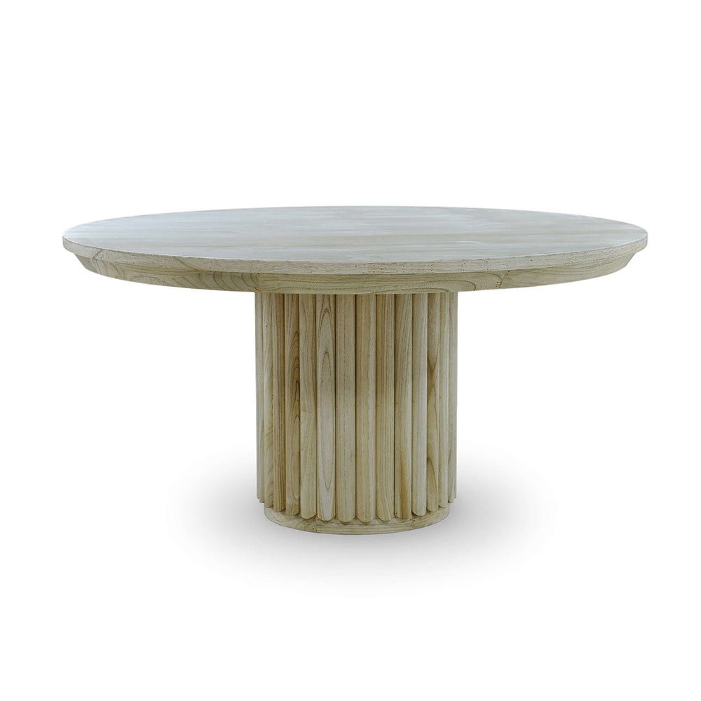 Round dining table in fruitwood finish, side view.