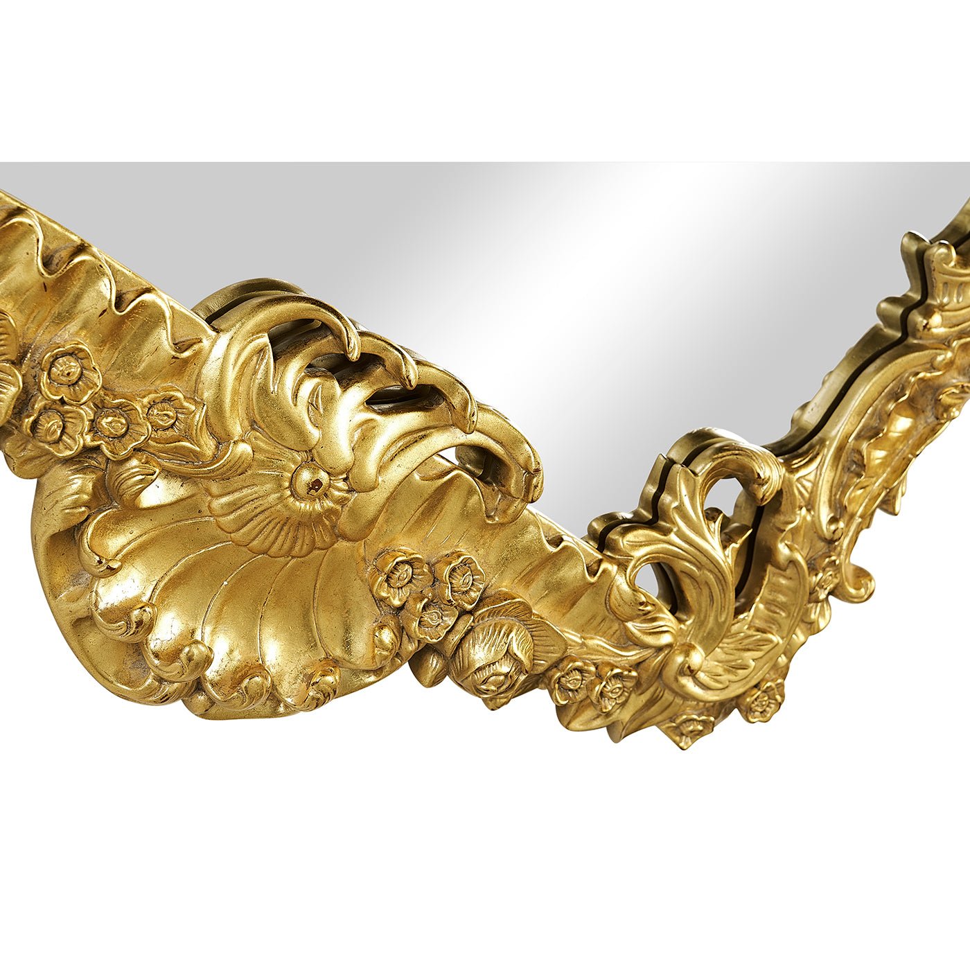 Bottom detail of Rococo mirror's ornate giltwood frame.