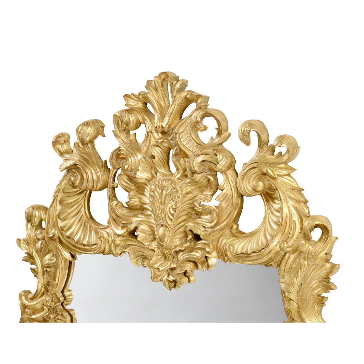 Detailed top section of Rococo giltwood mirror.