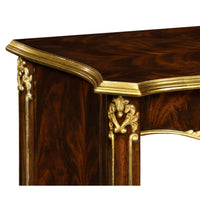 Corner detailing of rococo nightstand with gilt trim.