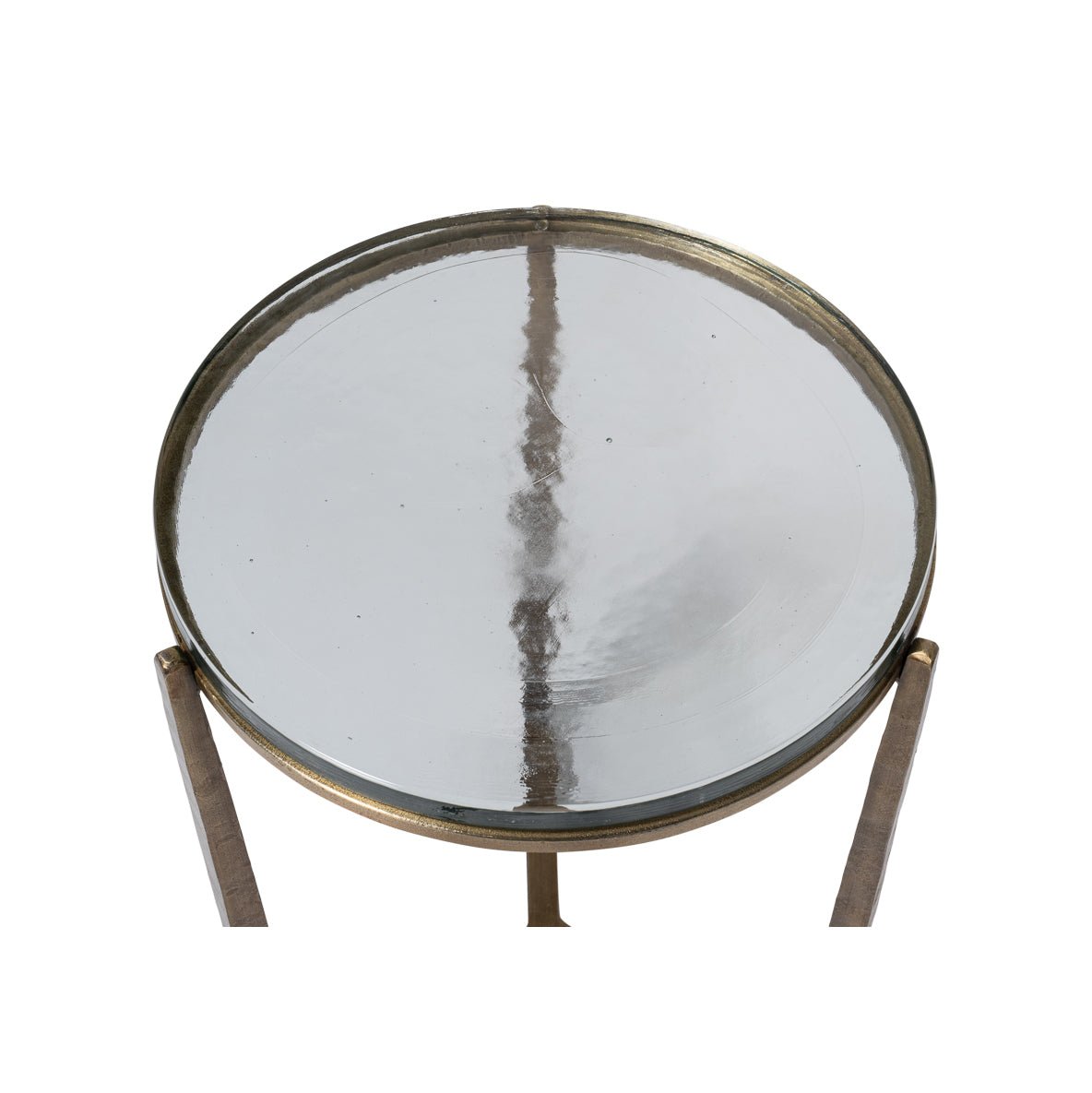 Close-up of round glass table surface.