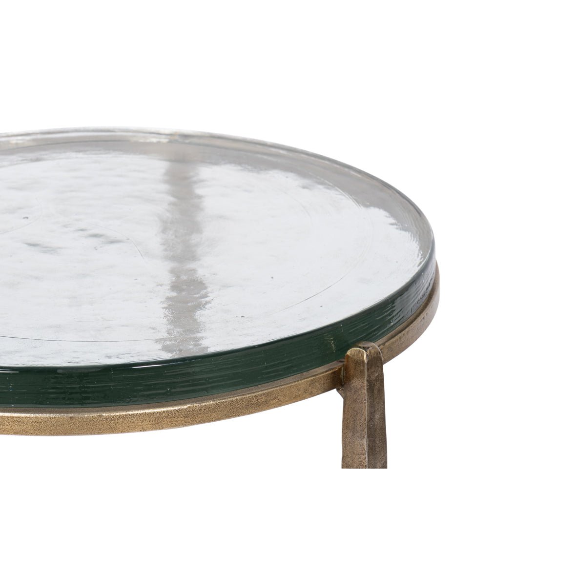 Close-up of glass top on round accent table.
