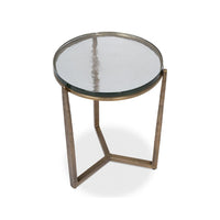 Top angled view of round glass accent table.
