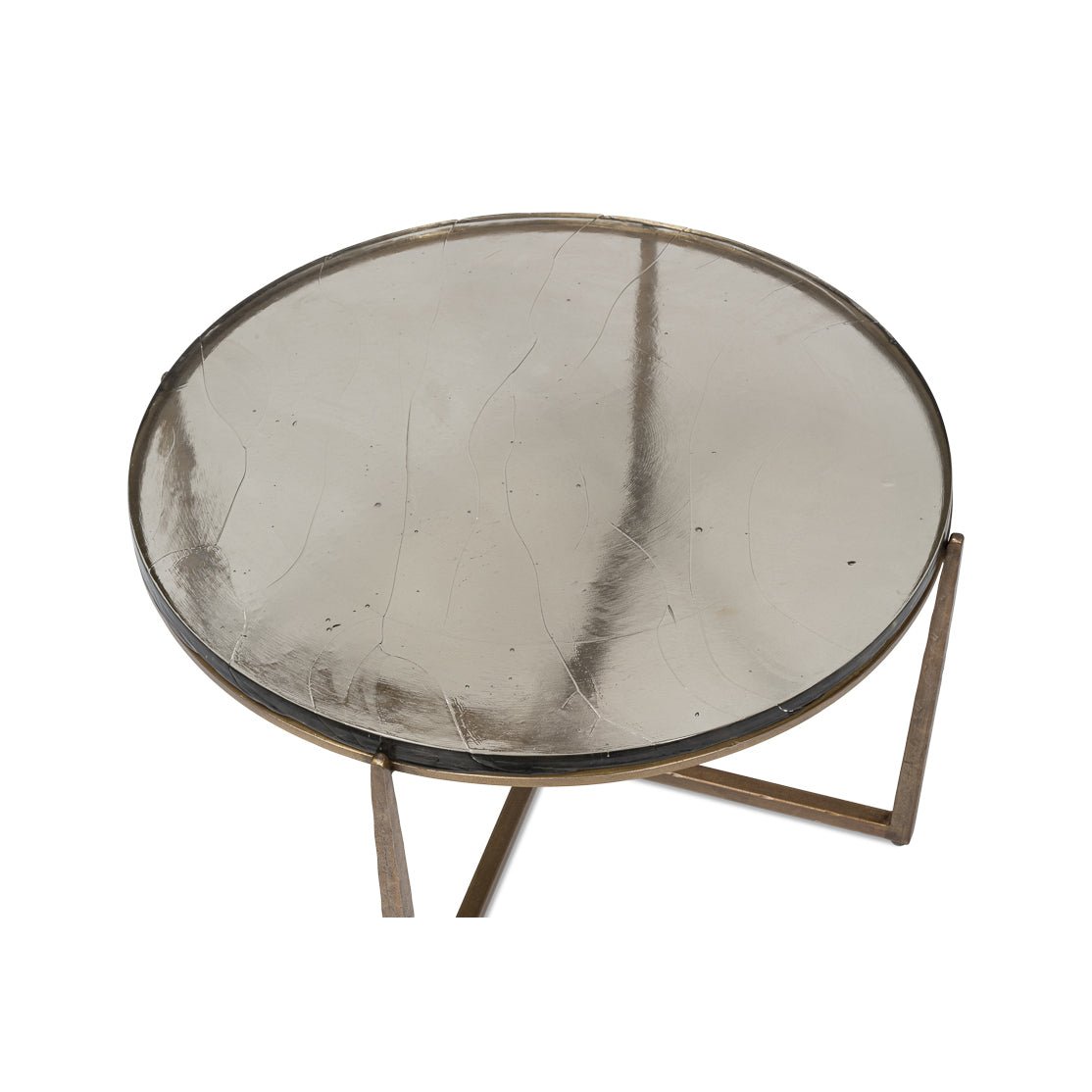 Close-up top view of round contemporary coffee table surface.