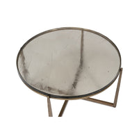 Close-up top view of round contemporary coffee table surface.