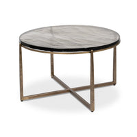 Round contemporary coffee table side view with cross base.