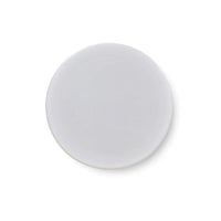 Top view of round white end table surface.