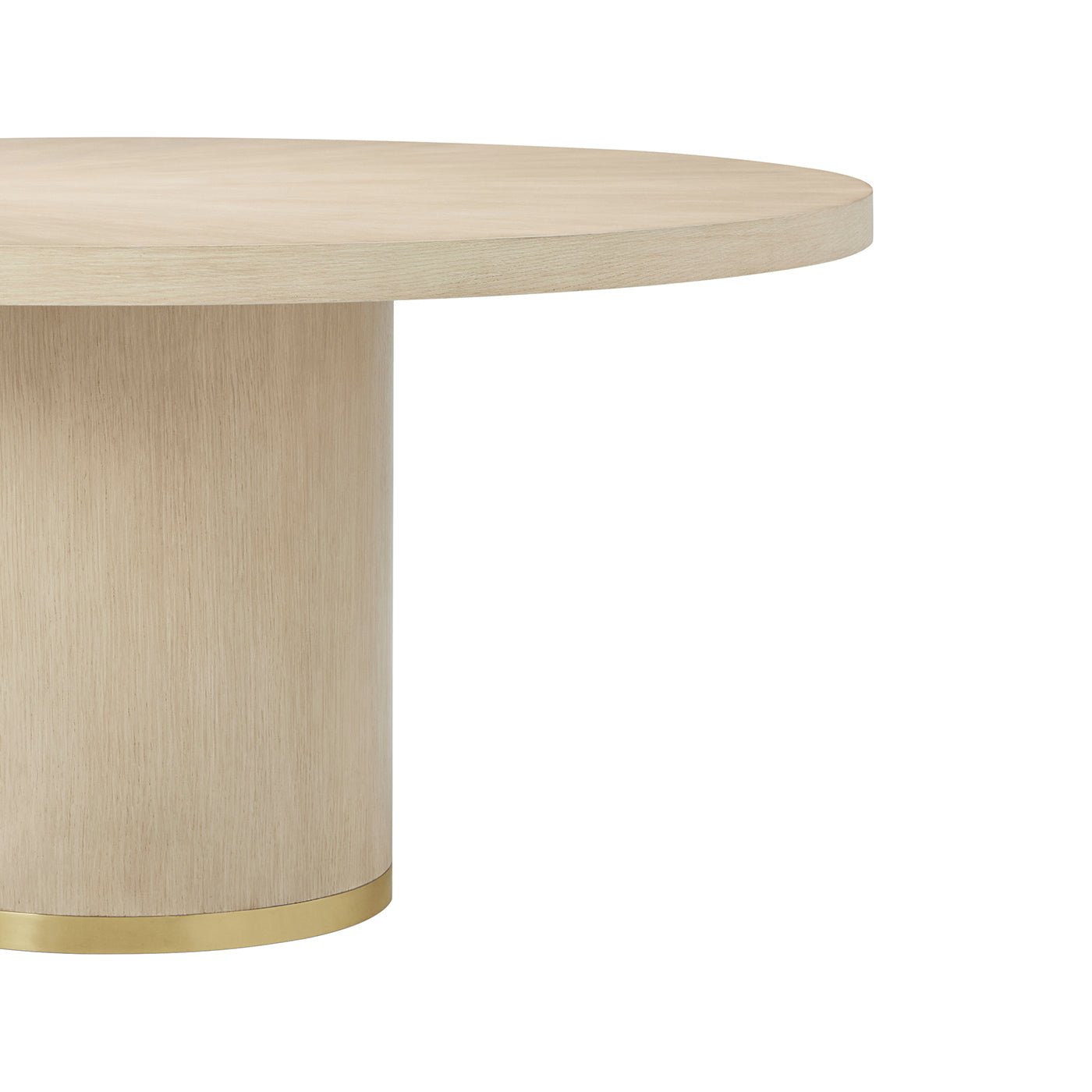 Cylindrical base with gold detailing on dining table.