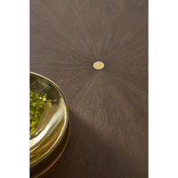 Detail of dark mink dining table's center gold accent.
