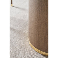Close-up of dark mink table base with gold accent.