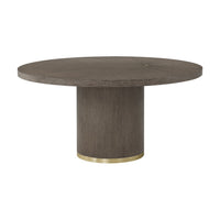Dark mink round dining table with gold accent base.