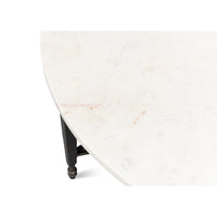 Close-up of marble top on coffee table.