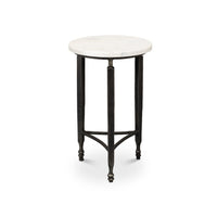 Minimalist marble top table with black metal legs.