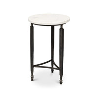Round marble top side table on white background.
