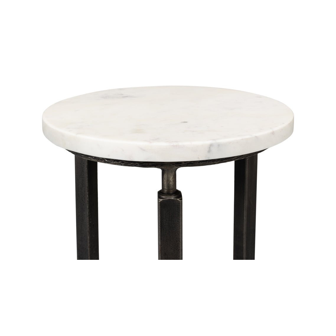Close-up of round marble tabletop on side table.