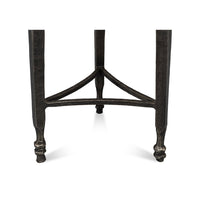 Close-up of table legs, industrial-style design.