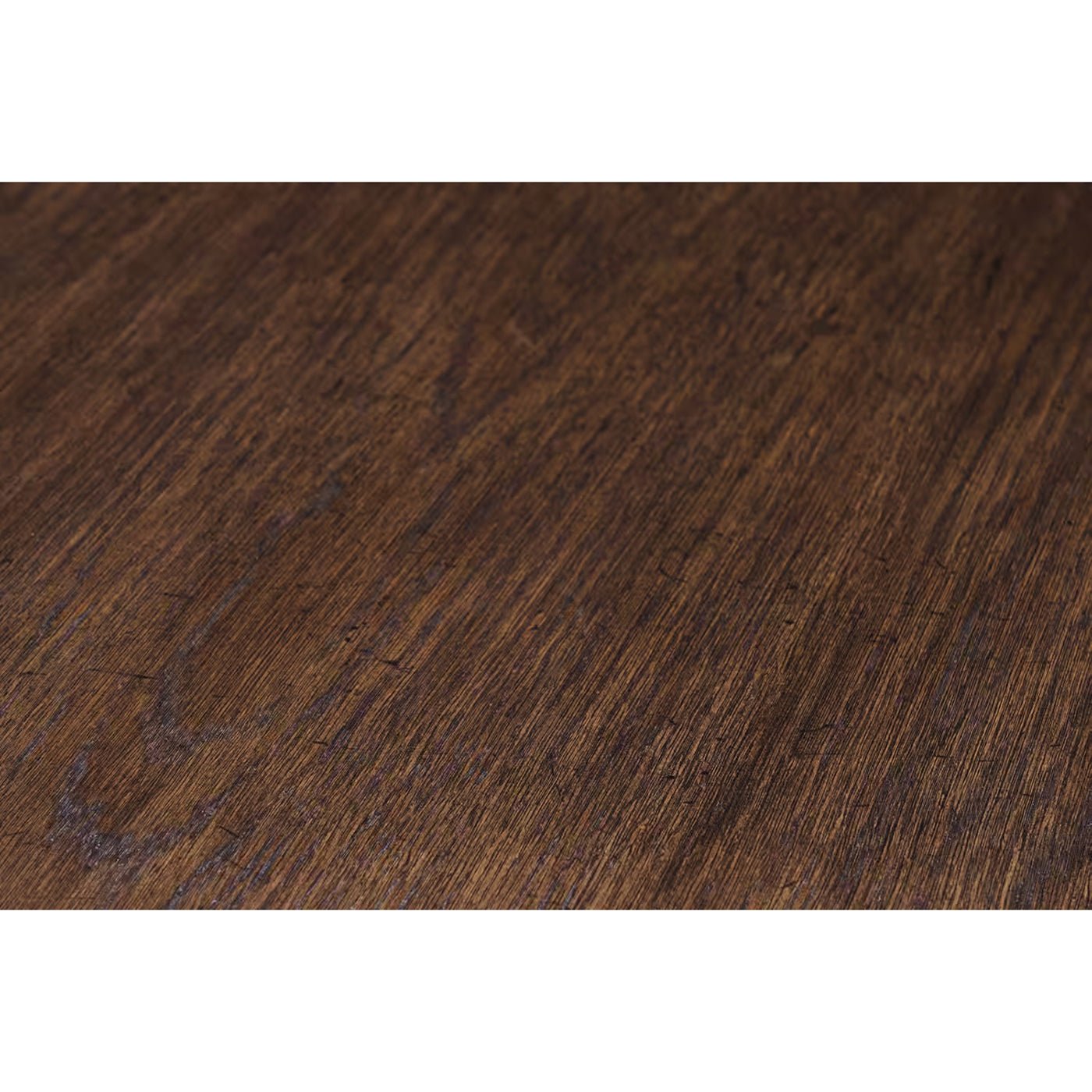 Dark oak finish texture of round dining table.