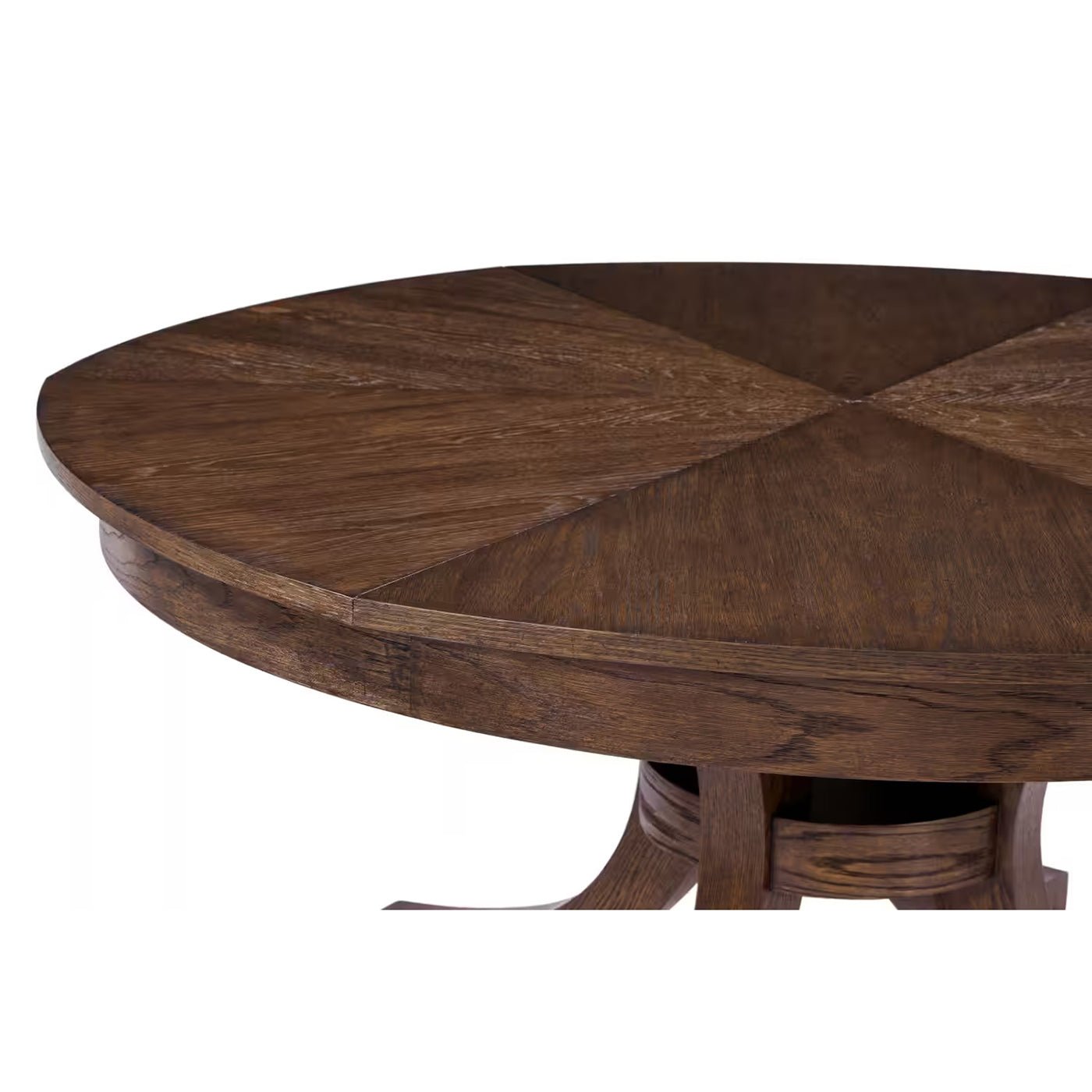 Close-up of round oak dining table surface design.