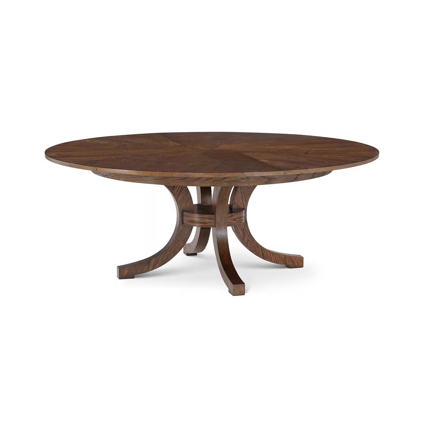 Round oak dining table with pedestal base, top view.