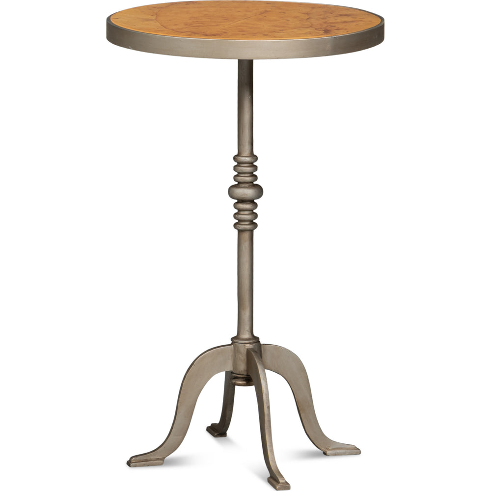 Round side table with a tobacco leaf top on a cast base with an aged iron patina