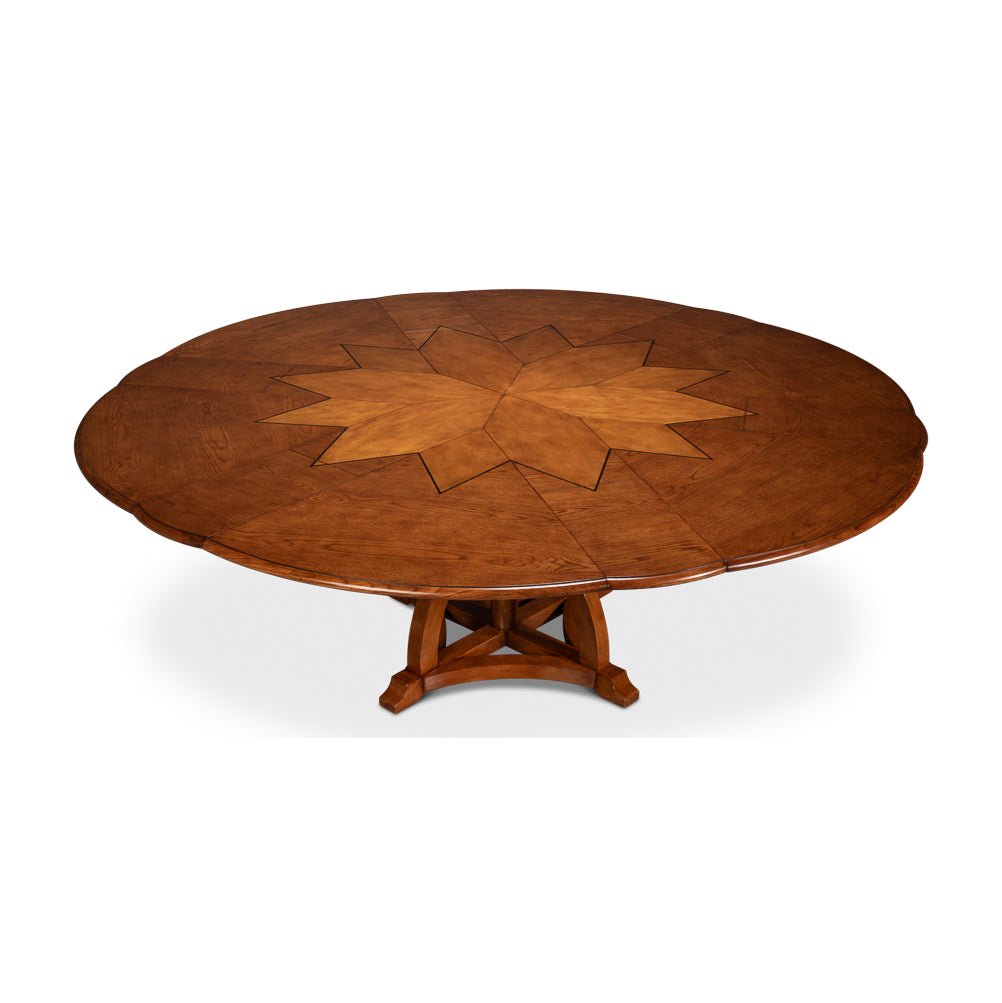 Fully extended view of round walnut dining table.