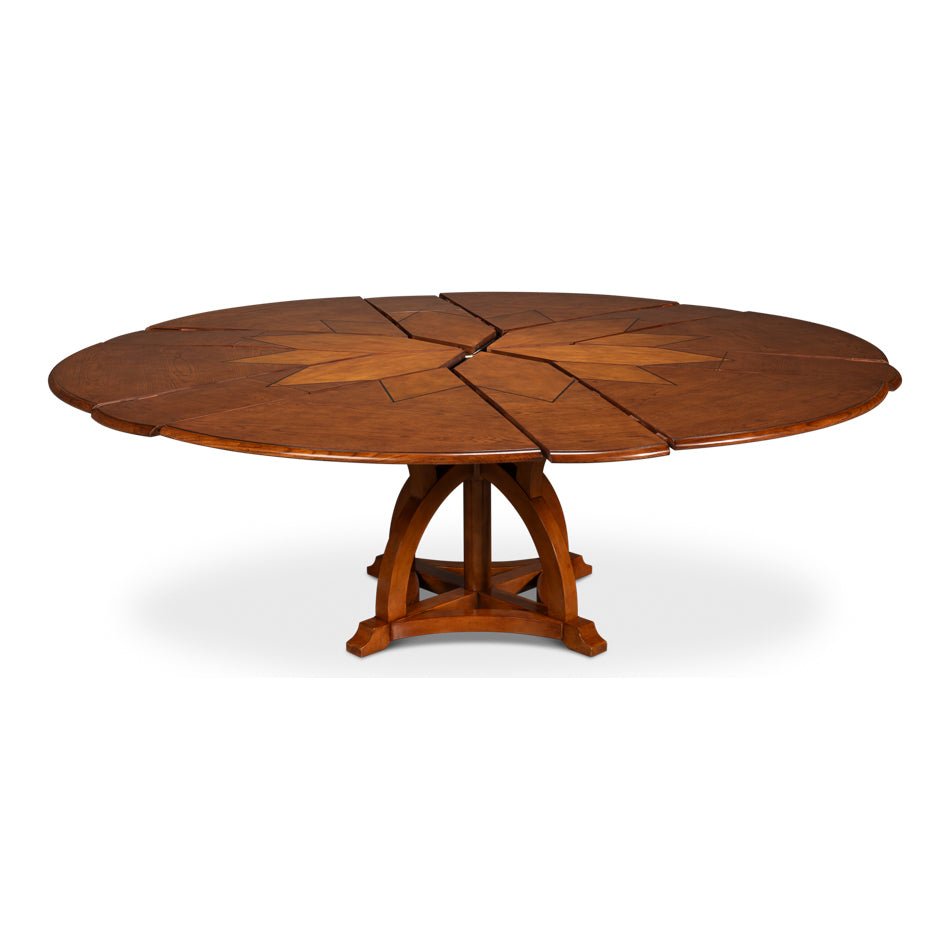 Partially extended walnut Jupe dining table, expanded segments.