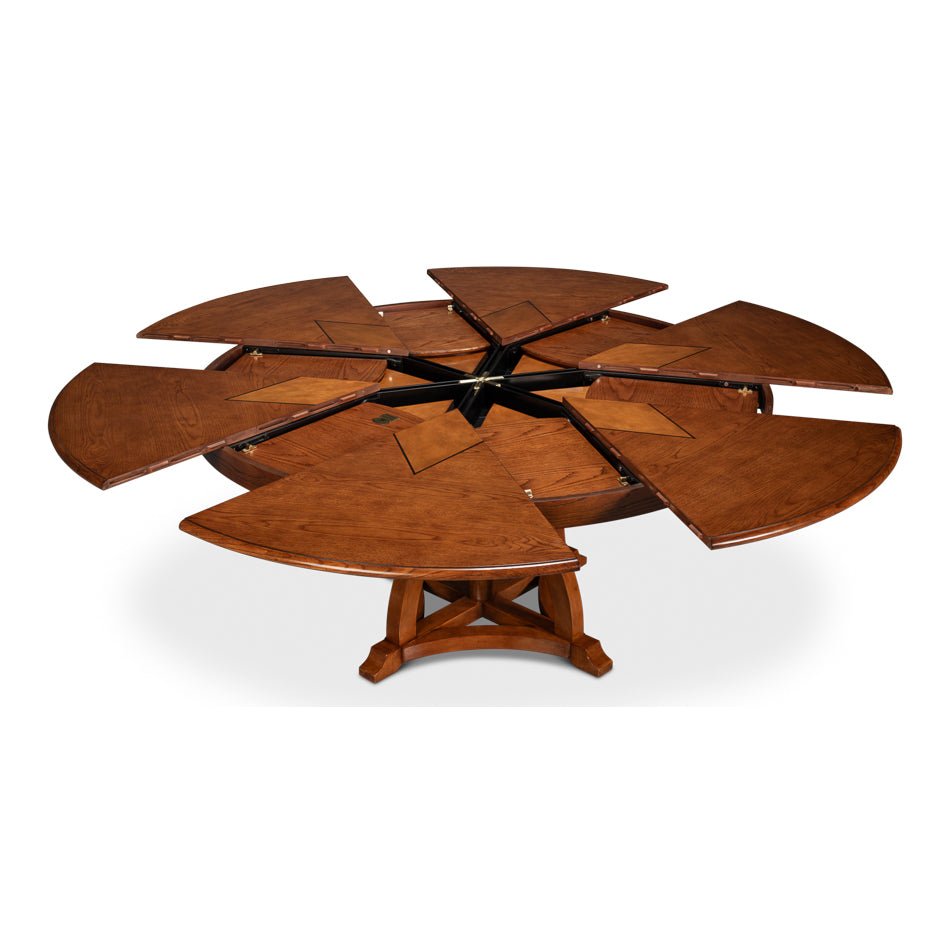 Walnut Jupe dining table with open segments and star pattern.