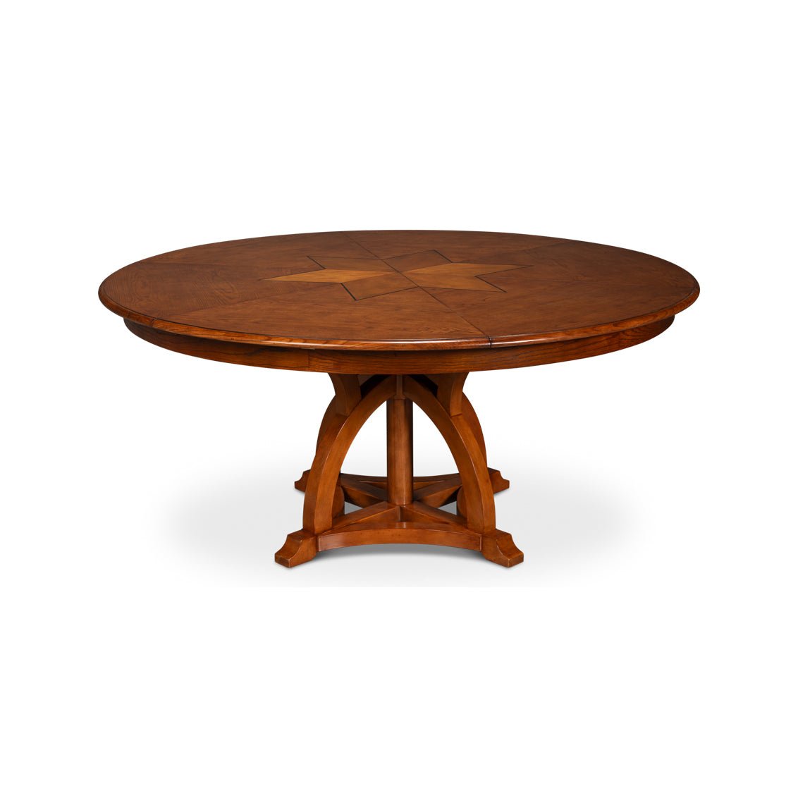 Compact round walnut Jupe dining table with star design.