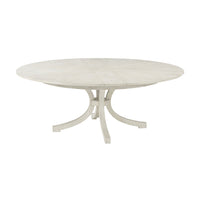 Round white dining table on white background