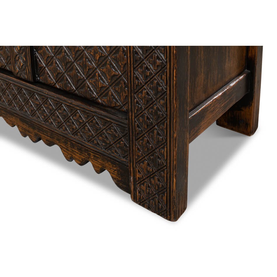 Close-up of decorative sideboard leg detailing.