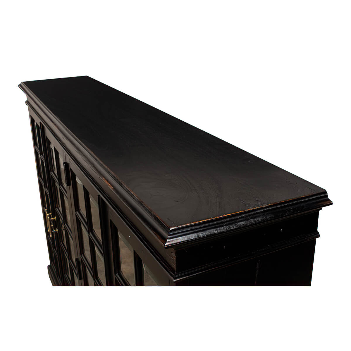 Top surface of black rustic country bookcase.