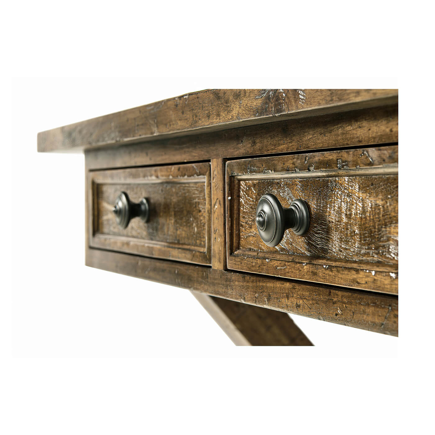 Detailed view of drawer knobs on rustic desk.