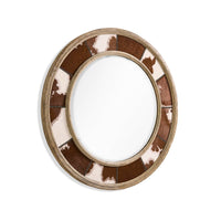 Side view of cowhide inlay round mirror.