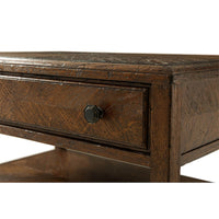 Close-up of drawer knob on rustic nightstand.