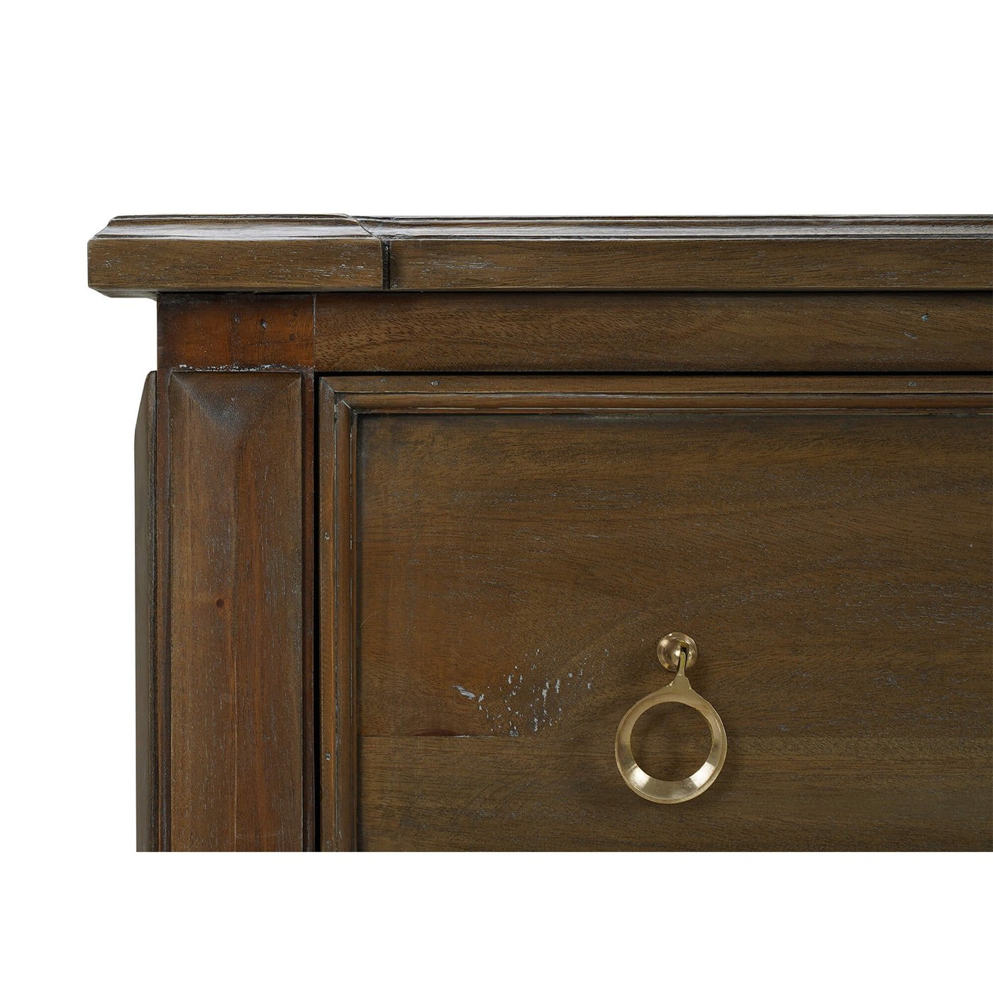 Corner detail of rustic chest of drawers, close-up.