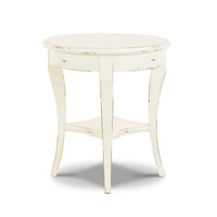 Rustic European round side table side view.