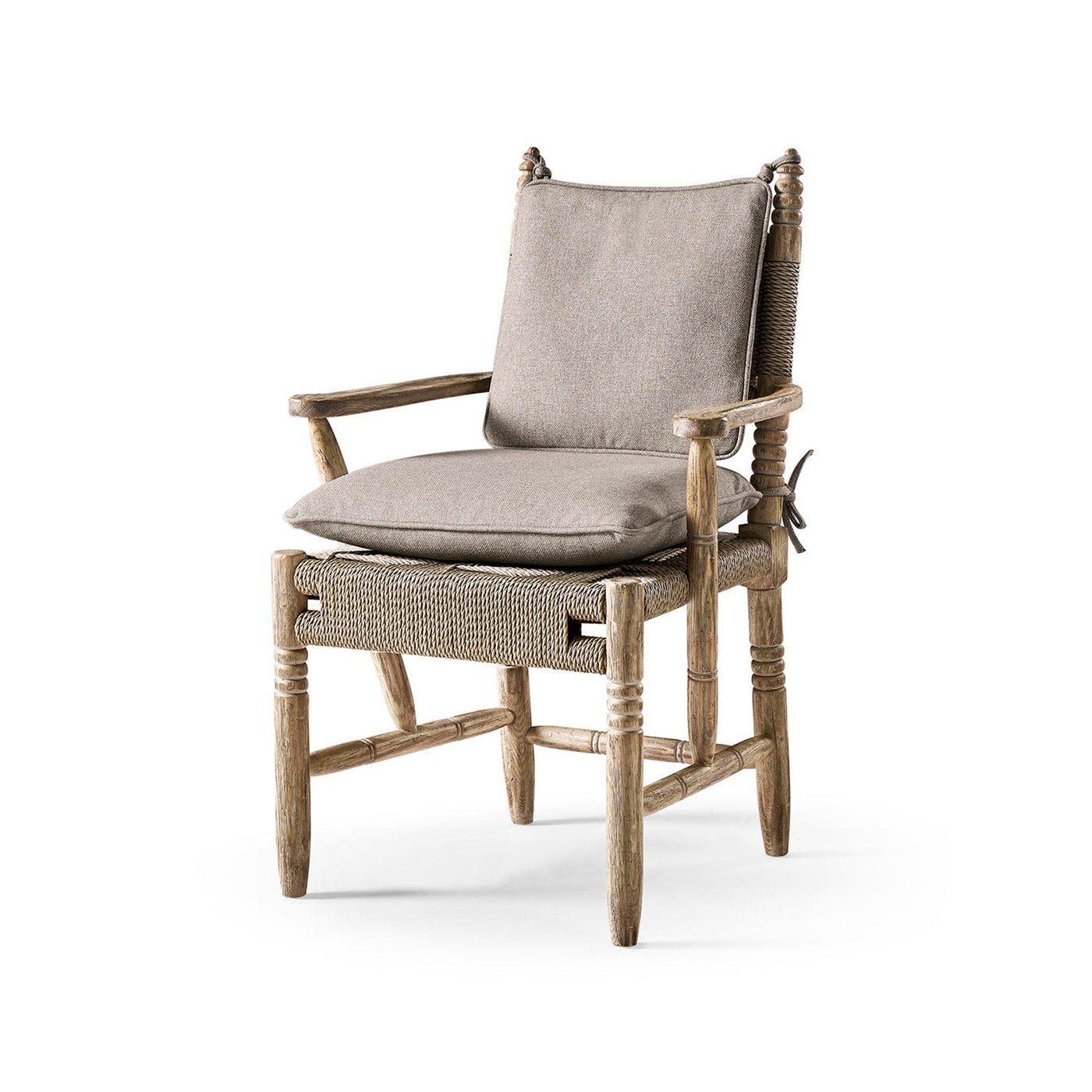 Rustic armchair with cushions, front view.