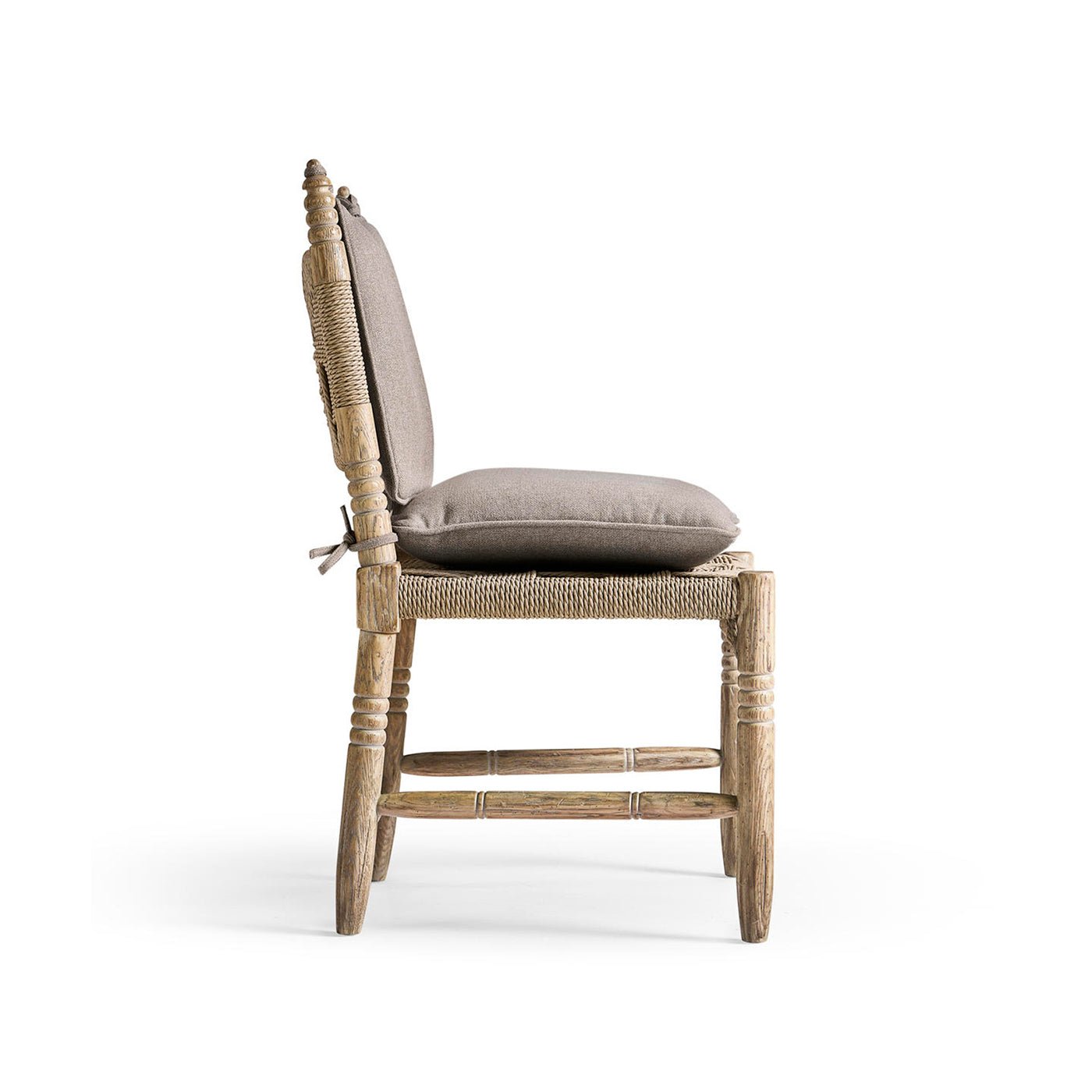 Rustic chair with cushion, side profile.