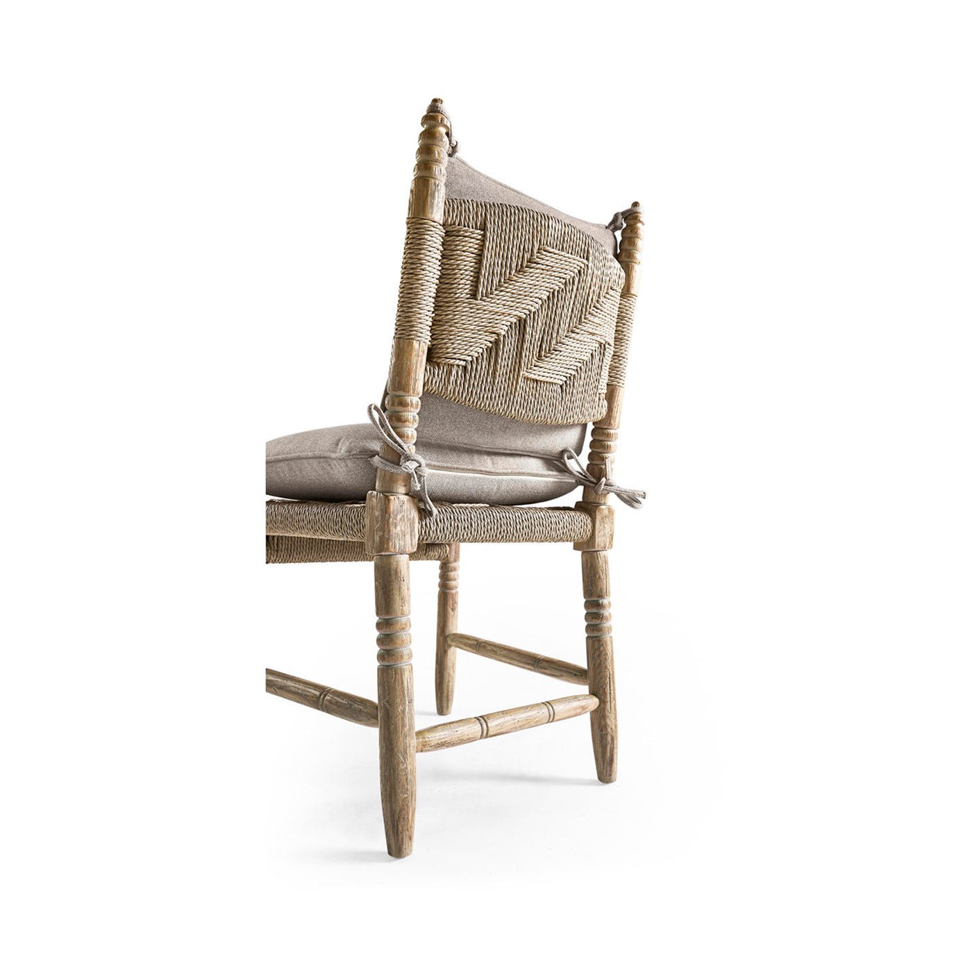 Rustic chair without cushion, side view.