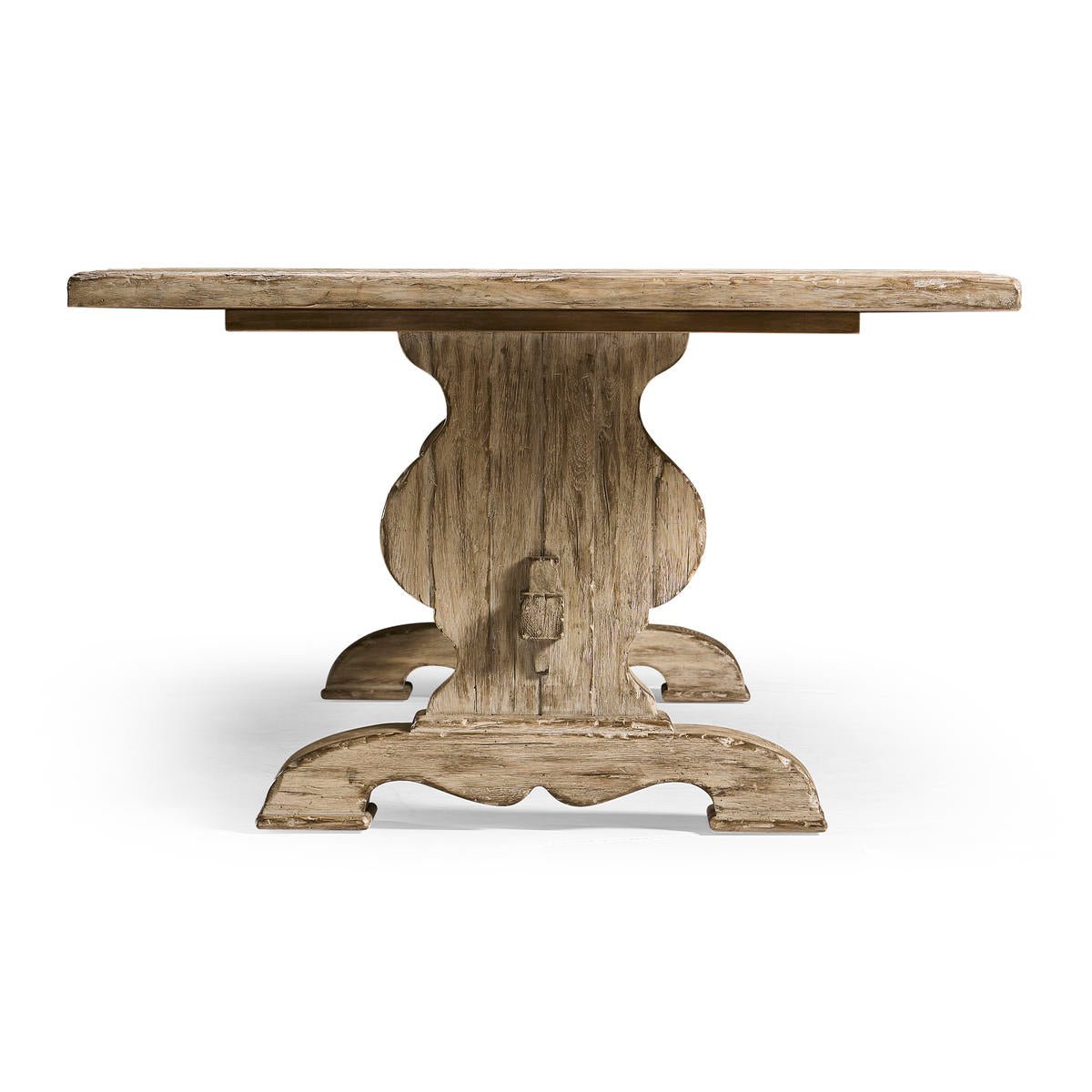 Side profile of rustic trestle dining table.