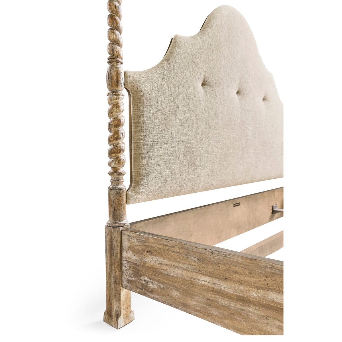 Rustic farmhouse bed, headboard and post close-up.