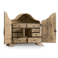 Rustic farmhouse cabinet interior, various drawers open, curved top.