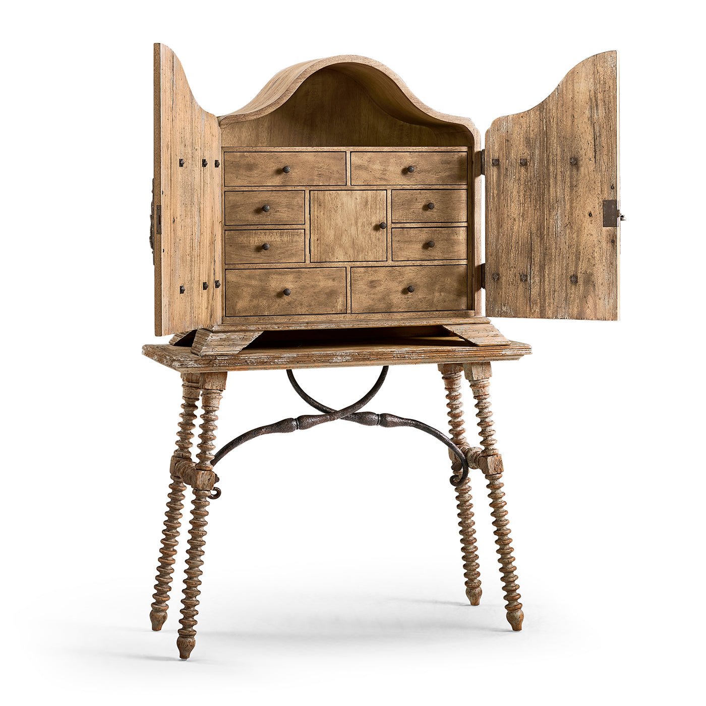 Rustic farmhouse cabinet open, multiple small interior drawers visible.
