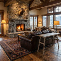Rustic console table in living room with stone fireplace.