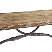 Console table surface with weathered wood texture and ironwork.