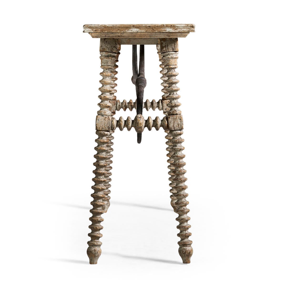 End view of console table showcasing intricate leg details.