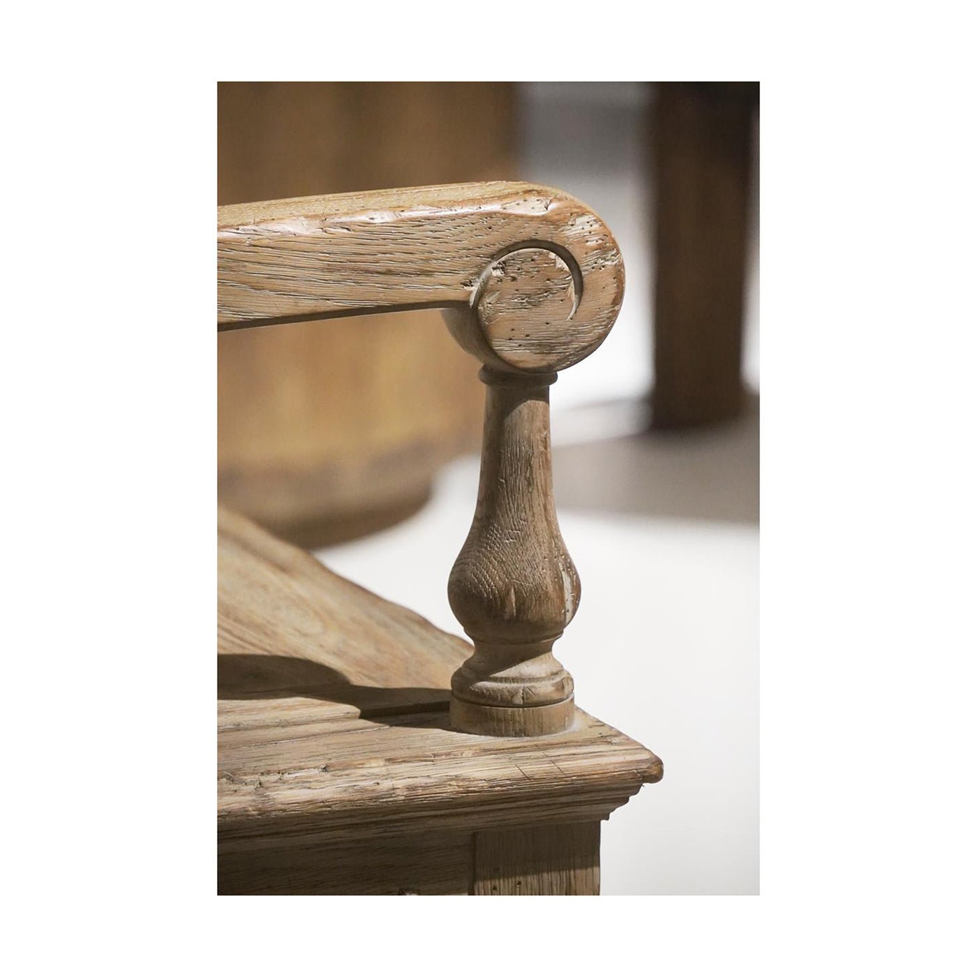 Armrest detail on rustic farmhouse storage bench.